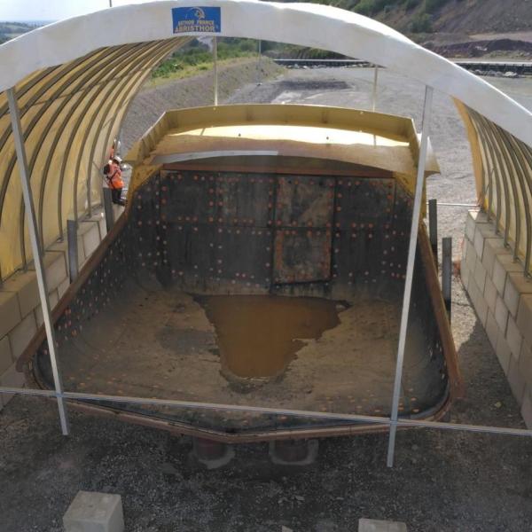 Cabine de peinture pour protéger la benne sur le site de la carrière